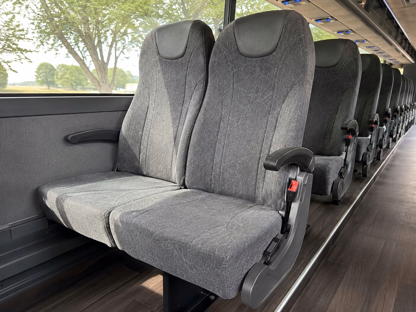 how time of year and peak season affect lansing charter bus prices