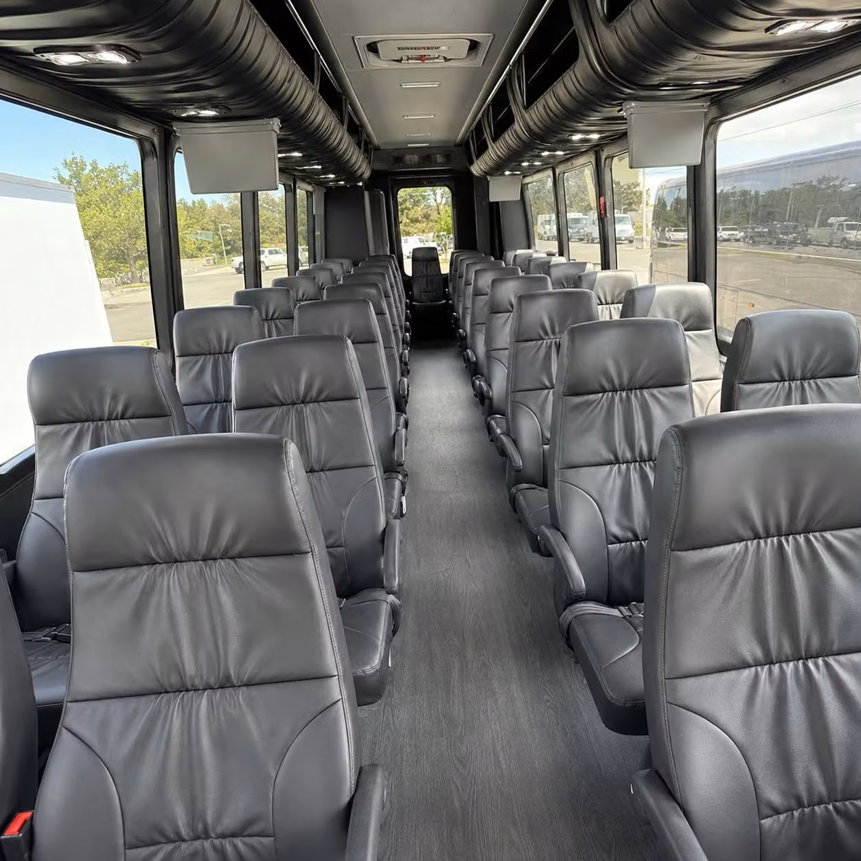 lansing 28 passenger minibus rental